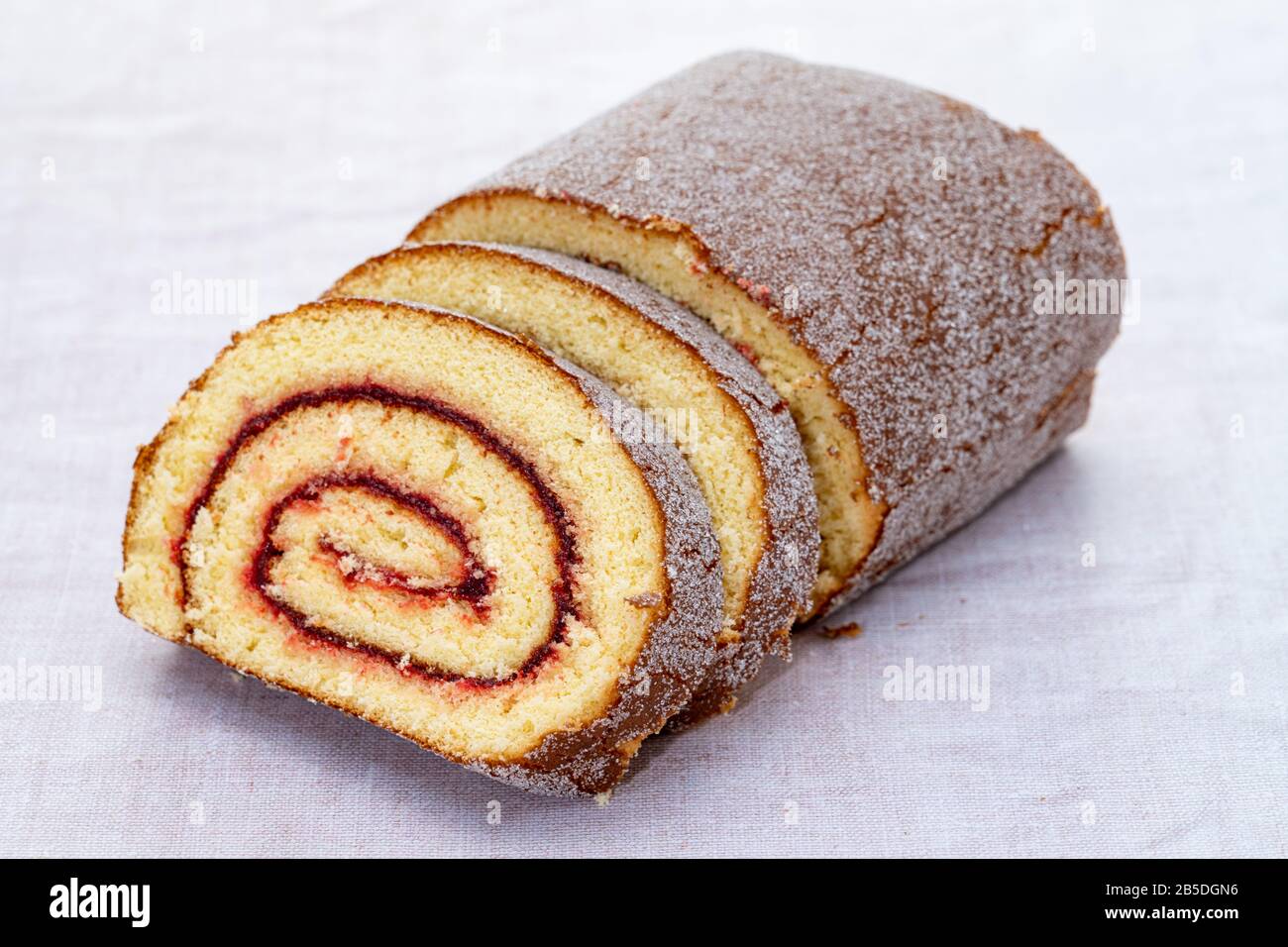 Strawberry jam swiss roll Stock Photo Alamy
