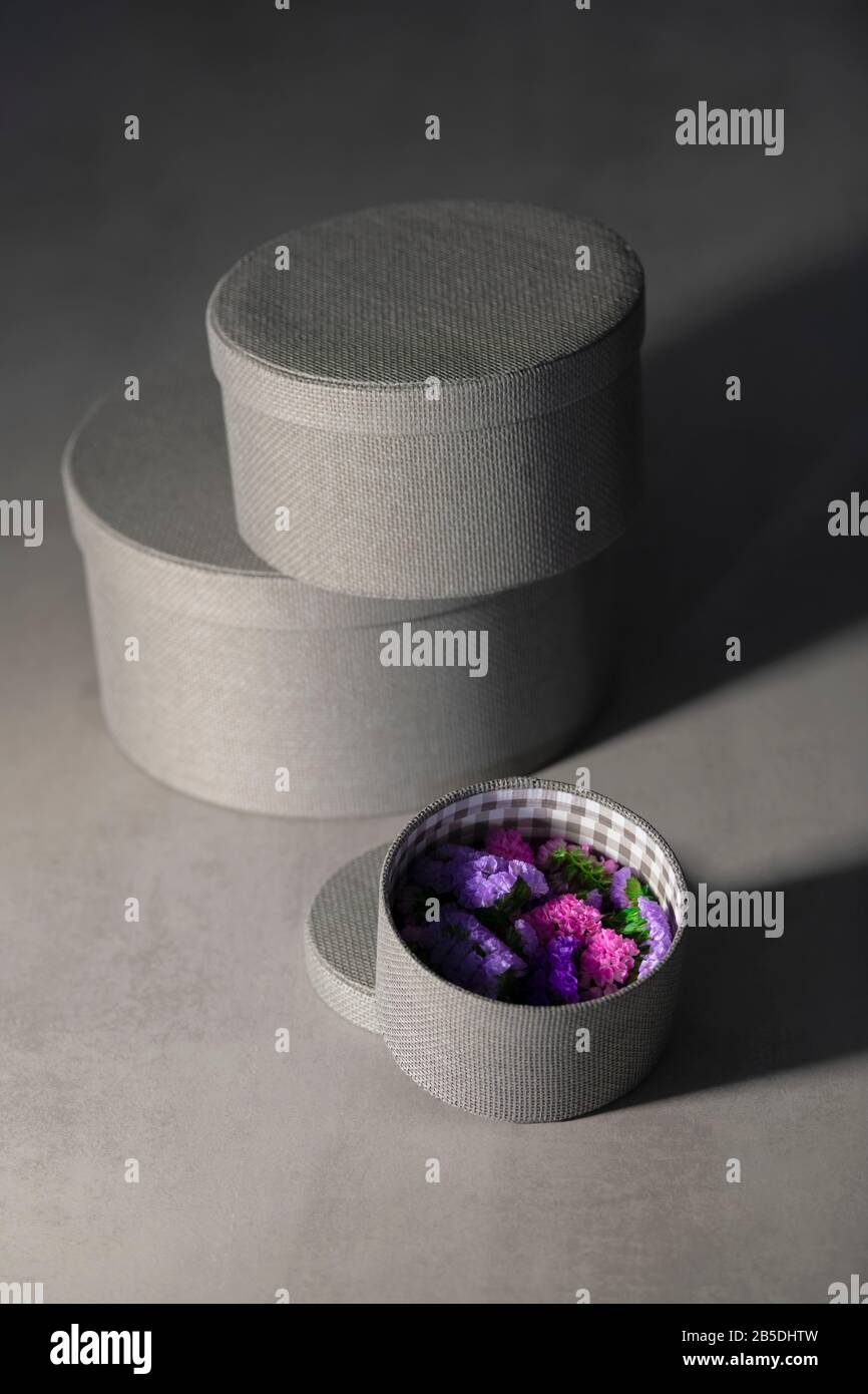 Different sized round boxes with beautiful flowers Stock Photo