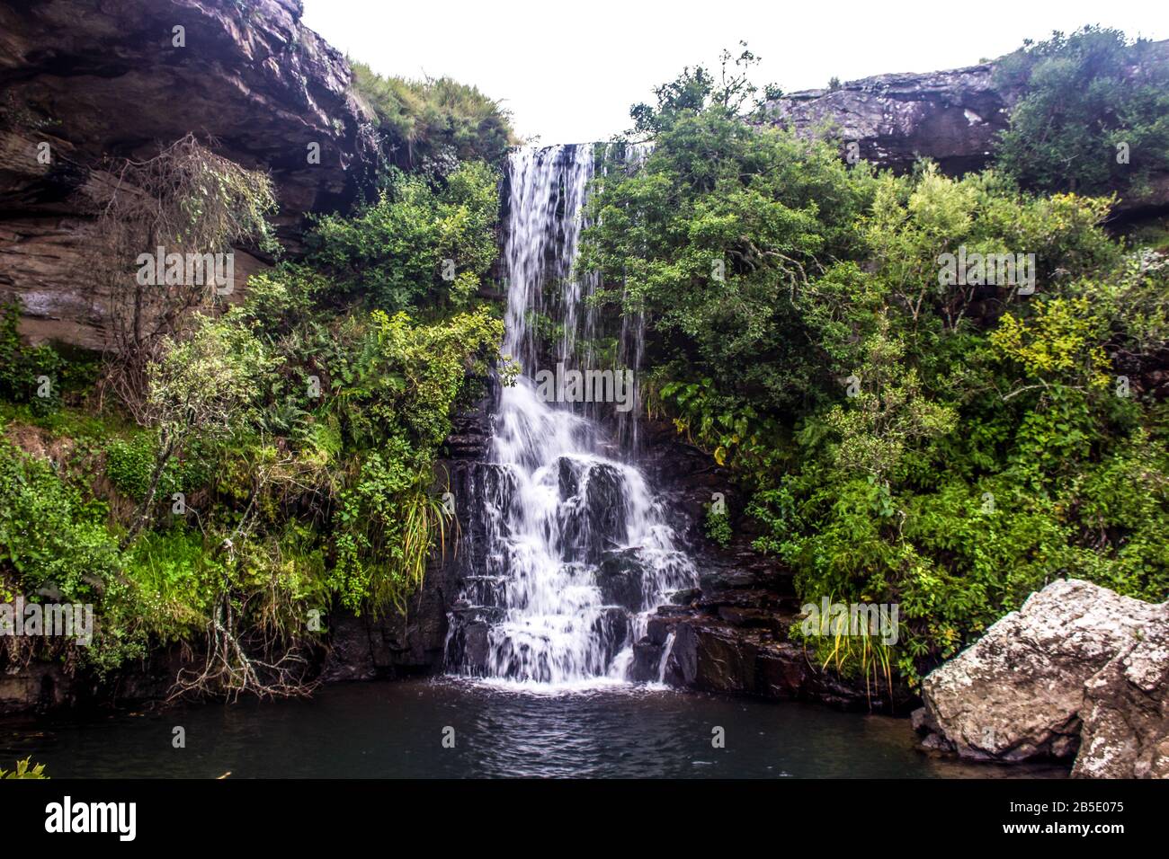 A small waterfall, falling into a secluded pool in the Troutbeck stream