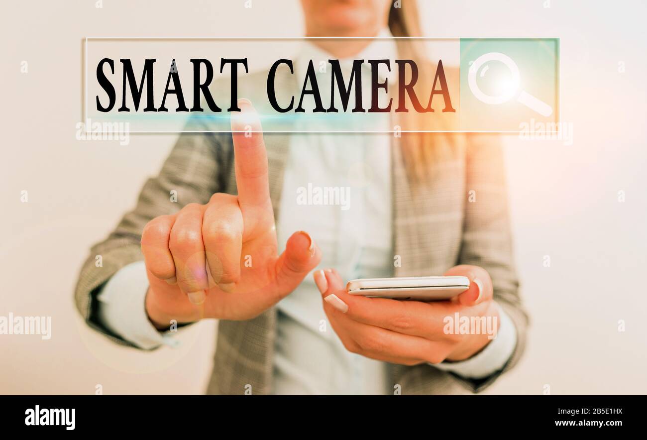 Writing note showing Smart Camera. Business concept for individual image processing systems designed to automate Stock Photo