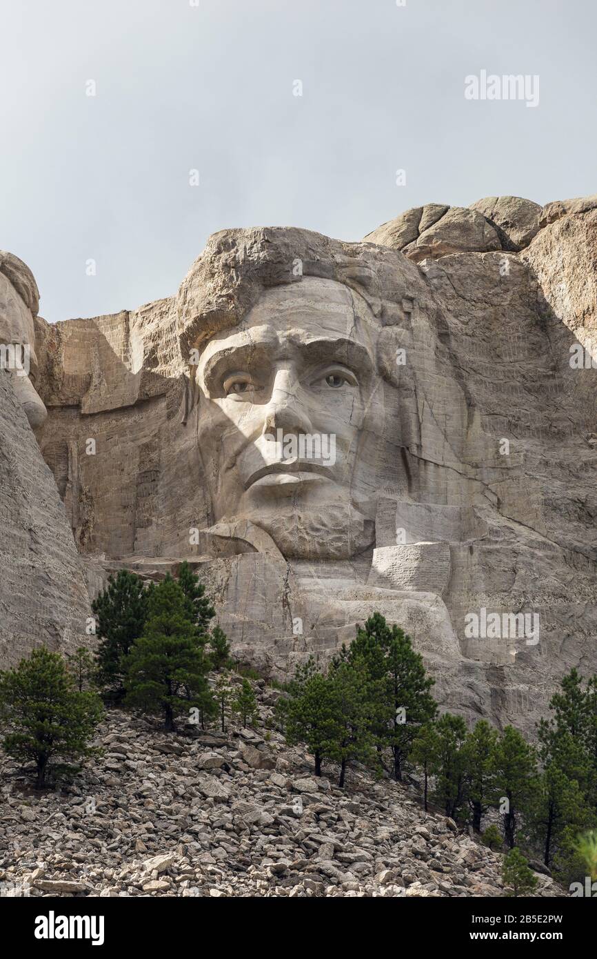 The face of Abraham Lincoln carved in rock at Mt. Rushmore in South Dakota. Stock Photo