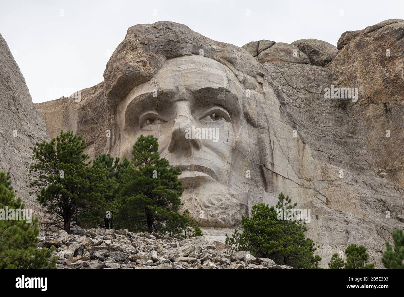 The face of Abraham Lincoln carved in rock at Mt. Rushmore in South Dakota. Stock Photo