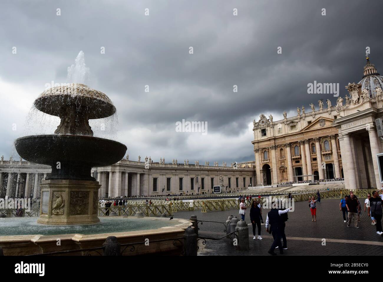 Vatican Obelisk, Maderno Fountain, Bernini´s Colonnade and Saint Peter´s Basilica on the Saint Peter´s Square in the city of Rome Stock Photo