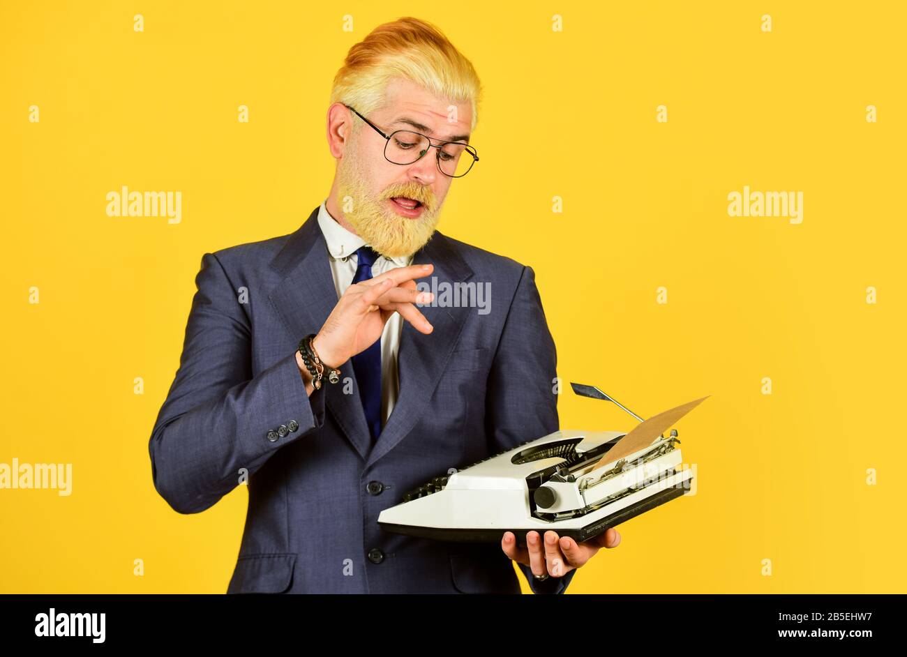 Connoisseur of vintage values. Vintage typewriter. Businessman use