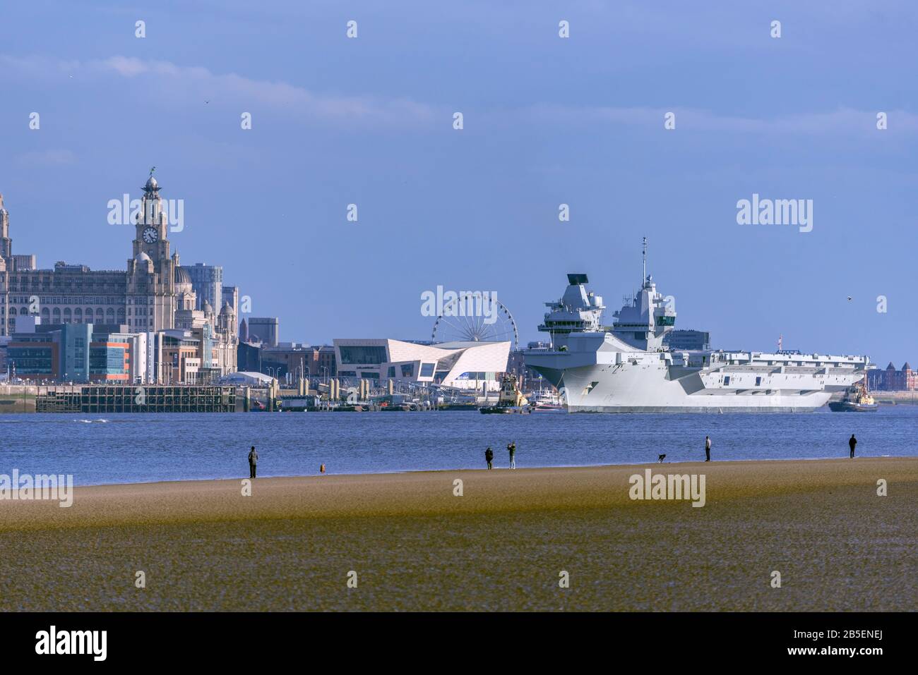 The Royal Navy's latest aircraft carrier HMS Prince of Wales leaves Liverpool pierhead after a week long courtesy visit. Stock Photo