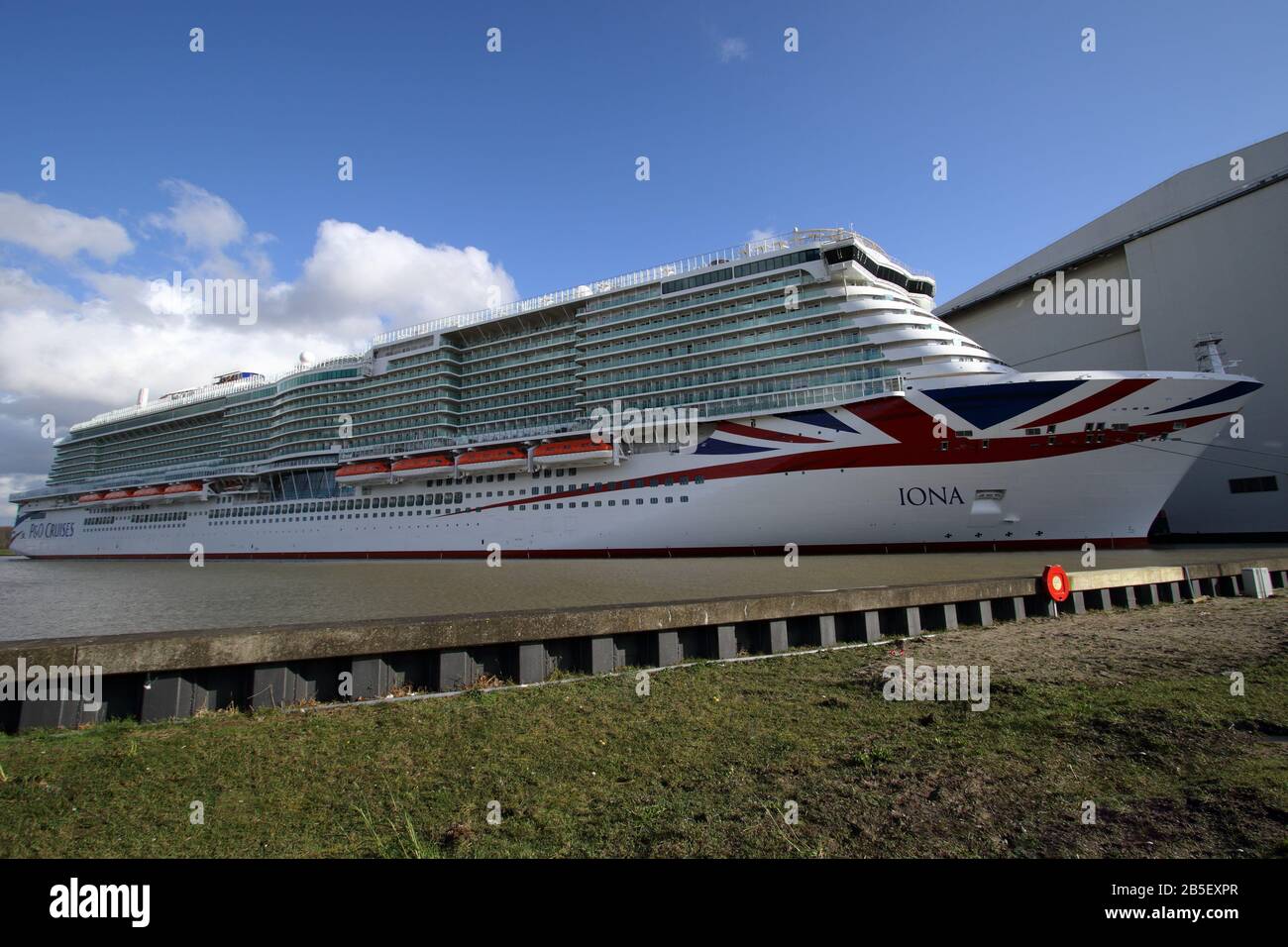The new cruise ship IONA will be moored in front of the Meyer shipyard in Papenburg on March 1, 2020. Stock Photo