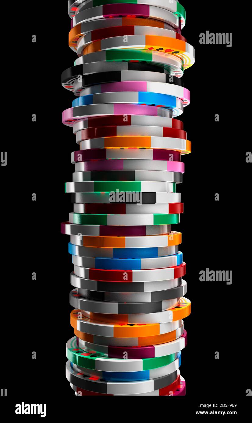 Gambling chips stacked high against a black background. Stock Photo