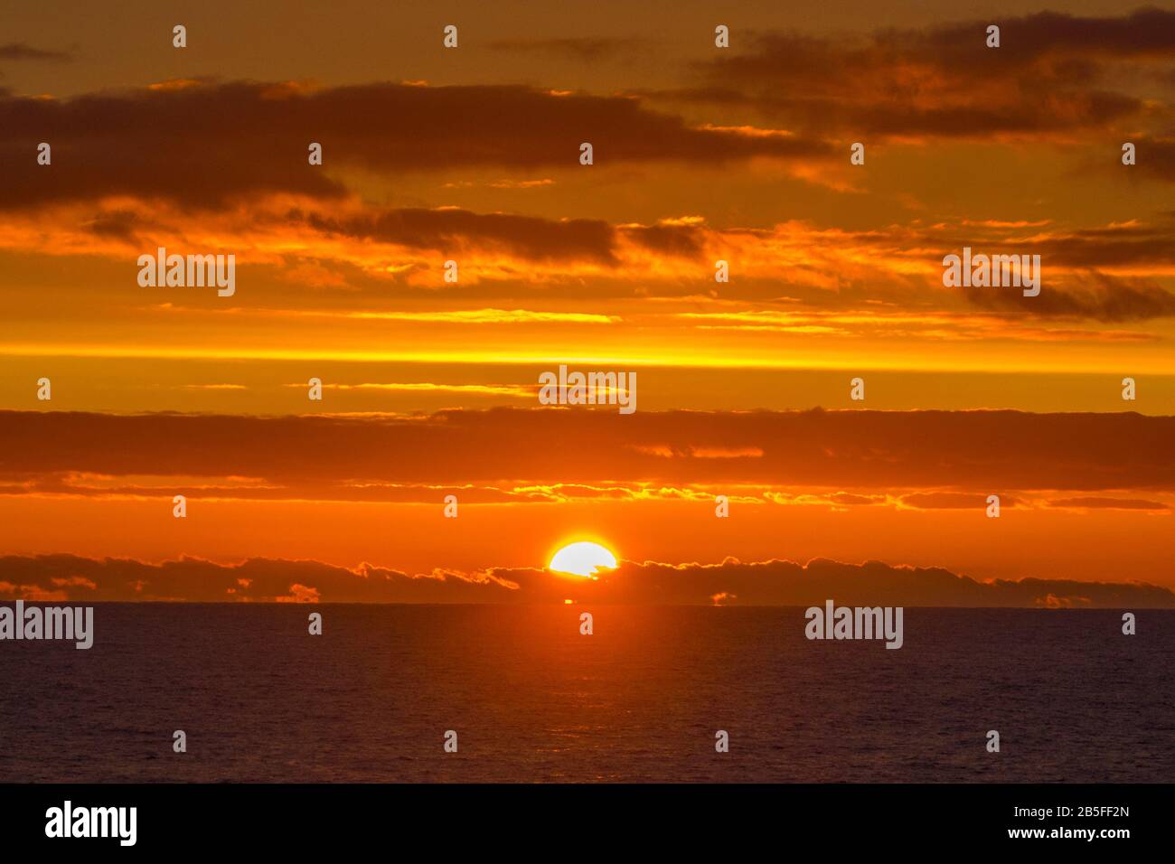 Sunset over the ocean Stock Photo