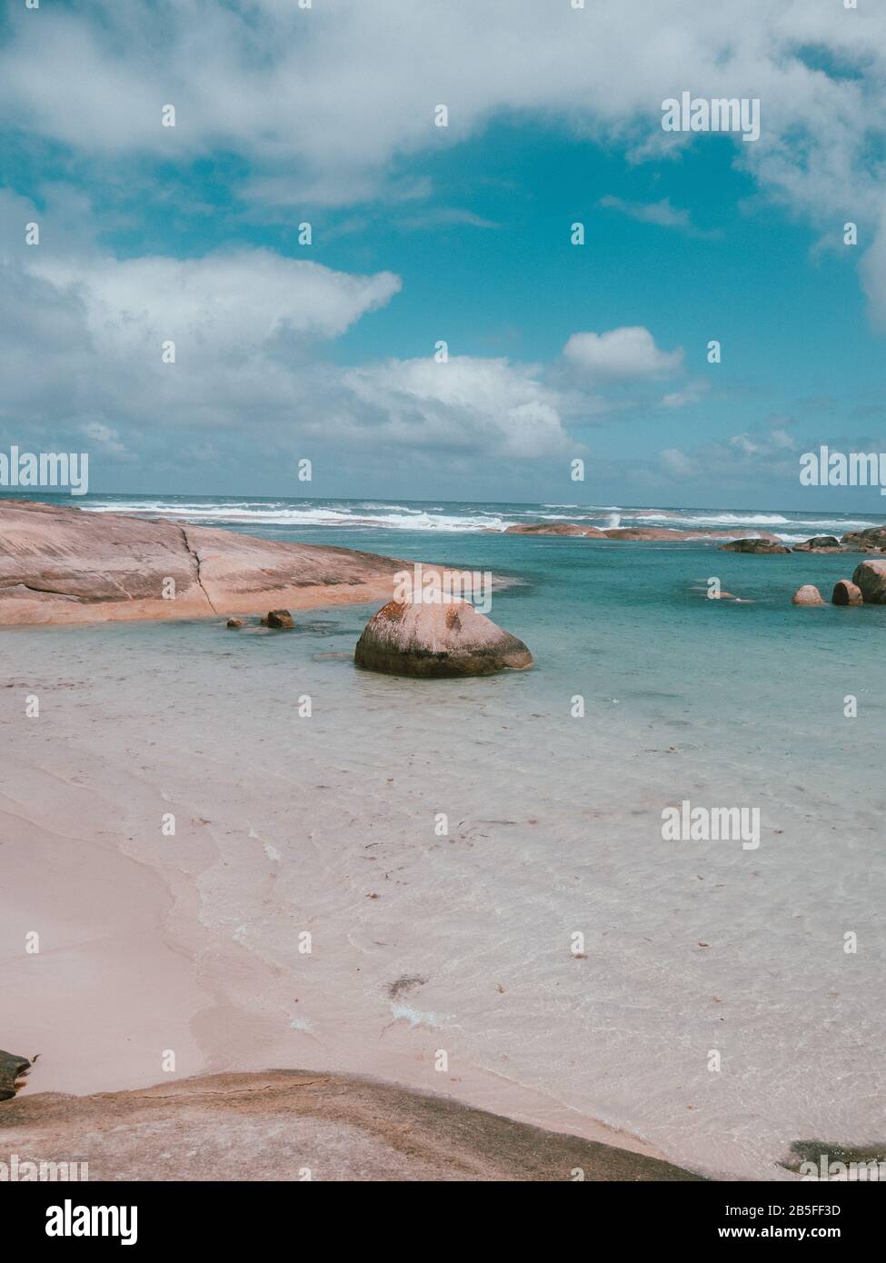 Some rocky blue open waters in the Australian sea Stock Photo