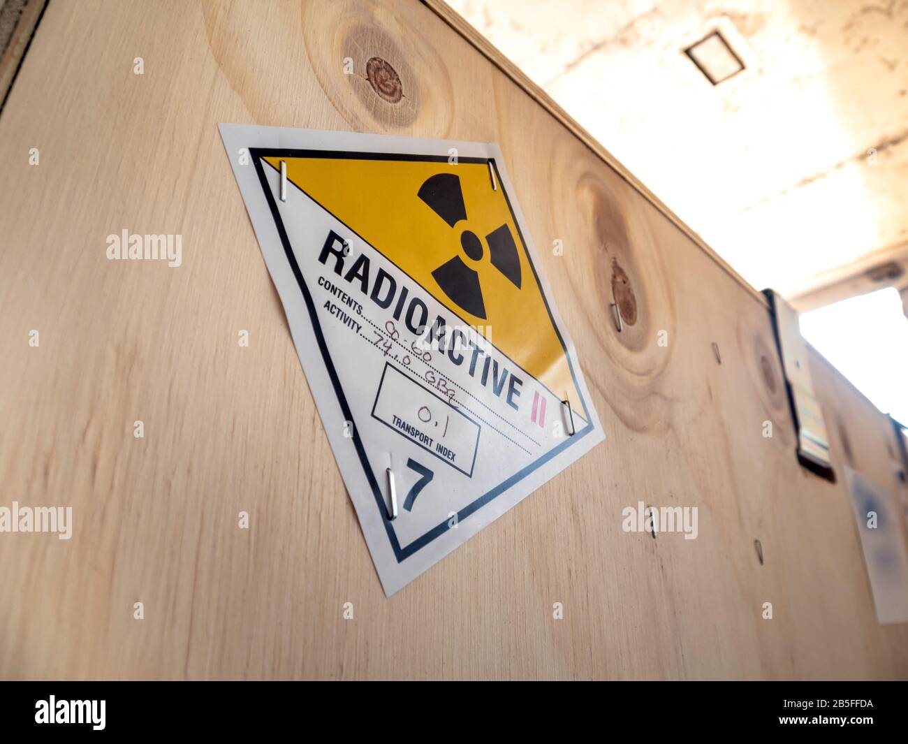 Radioactive material label beside the transportation wooden box Type A standard package Stock Photo