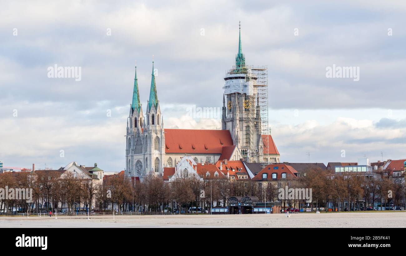 Panorama with church Saint Paul (german: St. Paul Kirche or Paulskirche). Main tower with scaffolding. Neo gothic architecture. Close to Theresienwies Stock Photo