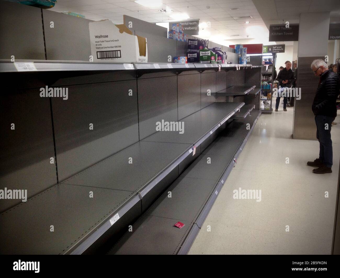 Saffron Walden, UK. 08th Mar, 2020. Cononavirus Panic Buying in Saffron Walden Essex UK. Empty shelves where toilet paper should be. 8 March 2020 Empty shelves in the Waitrose Supermarket in Saffron Walden Essex where panic buying of toilet paper has resulted in severe shortages. Credit: BRIAN HARRIS/Alamy Live News Stock Photo