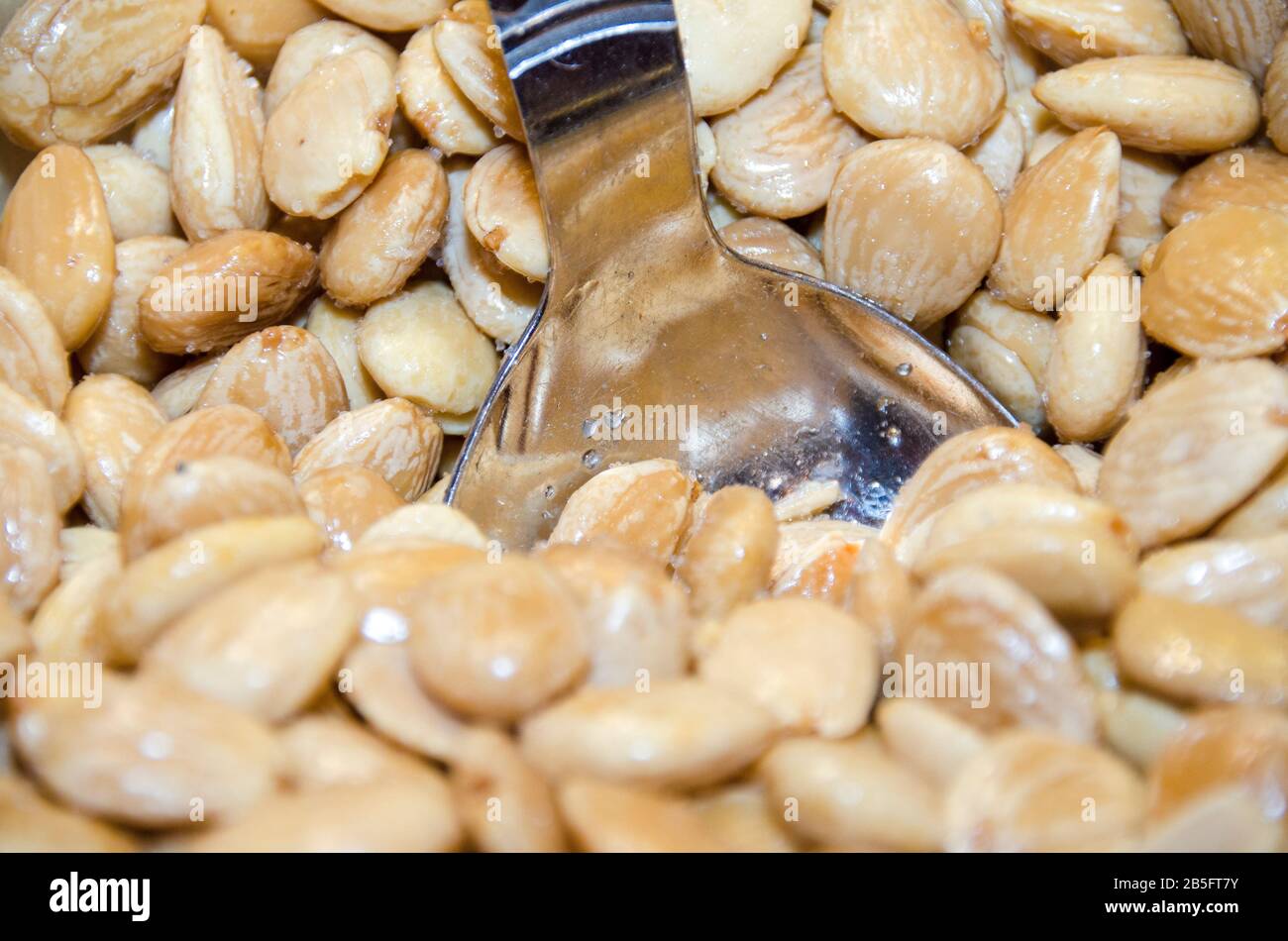 Salted almonds snack Stock Photo