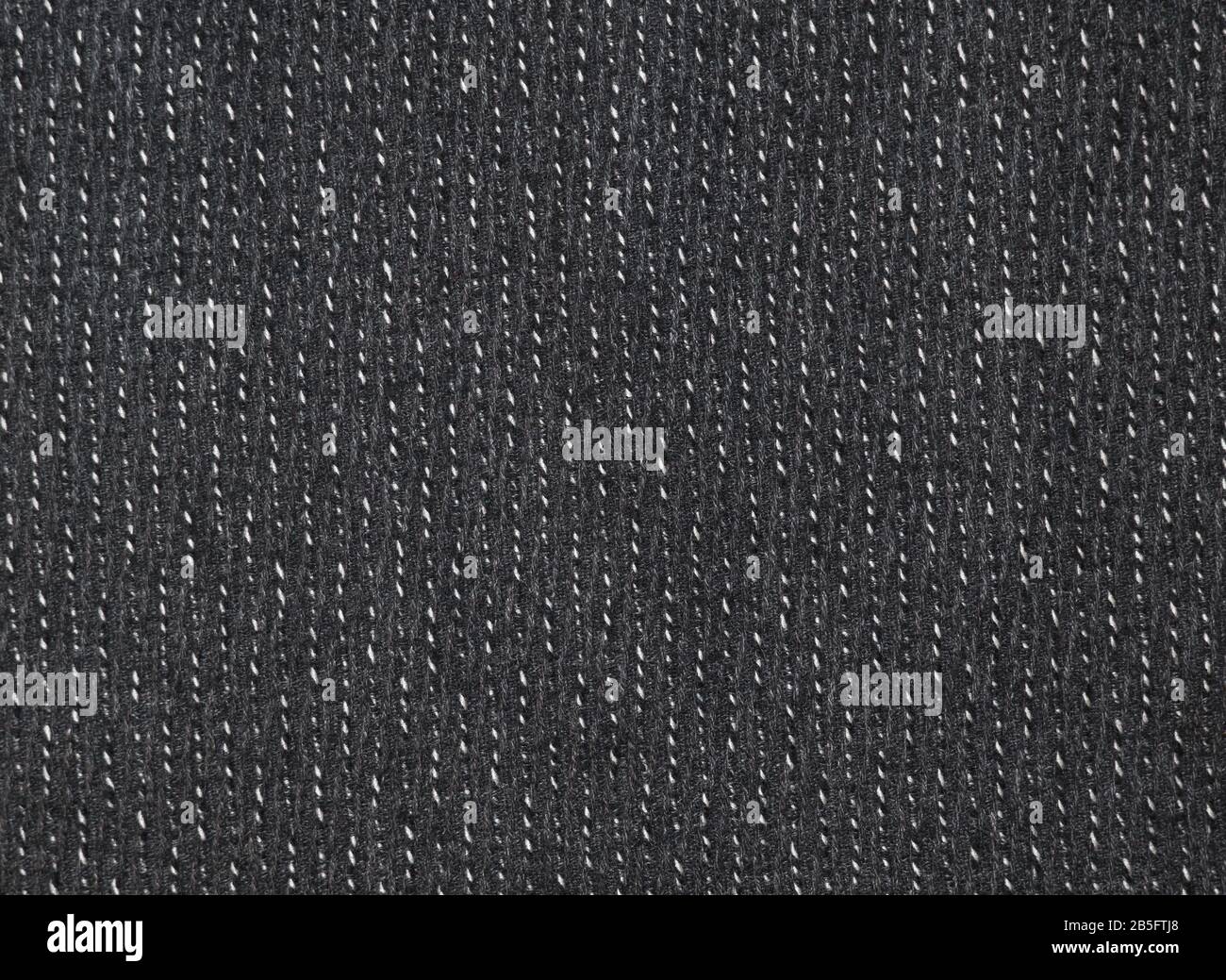 Dark black grey soft structural stripe fabric texture background wallpaper Stock Photo