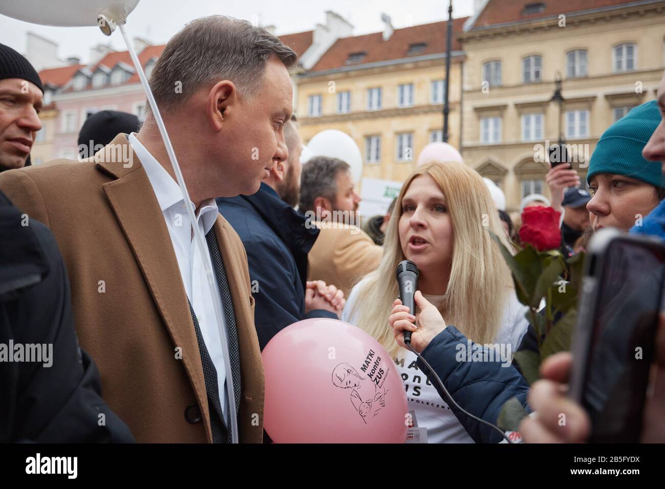 Warsaw, Mazovian, Poland. 8th Mar, 2020. A Walk Of The Presidential Couple During Which President ANDRZEJ DUDA Gave Flowers To Women He Met And Made Wishes On The Occasion Of Women's Day.in the picture: ANDRZEJ DUDA Credit: Hubert Mathis/ZUMA Wire/Alamy Live News Stock Photo