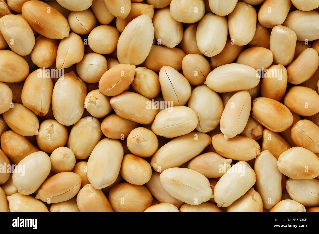 Peanut texture. Food background of peanuts bean. Golden, roasted organic peanuts. Wholesome