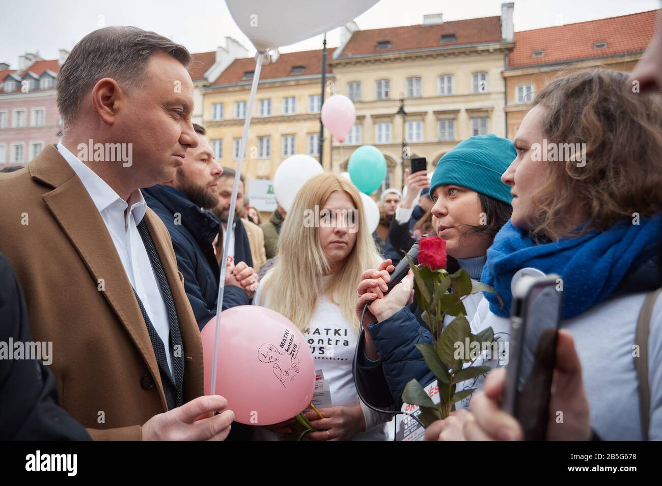 Warsaw, Mazovian, Poland. 8th Mar, 2020. A Walk Of The Presidential Couple During Which President ANDRZEJ DUDA Gave Flowers To Women He Met And Made Wishes On The Occasion Of Women's Day.in the picture: ANDRZEJ DUDA Credit: Hubert Mathis/ZUMA Wire/Alamy Live News Stock Photo