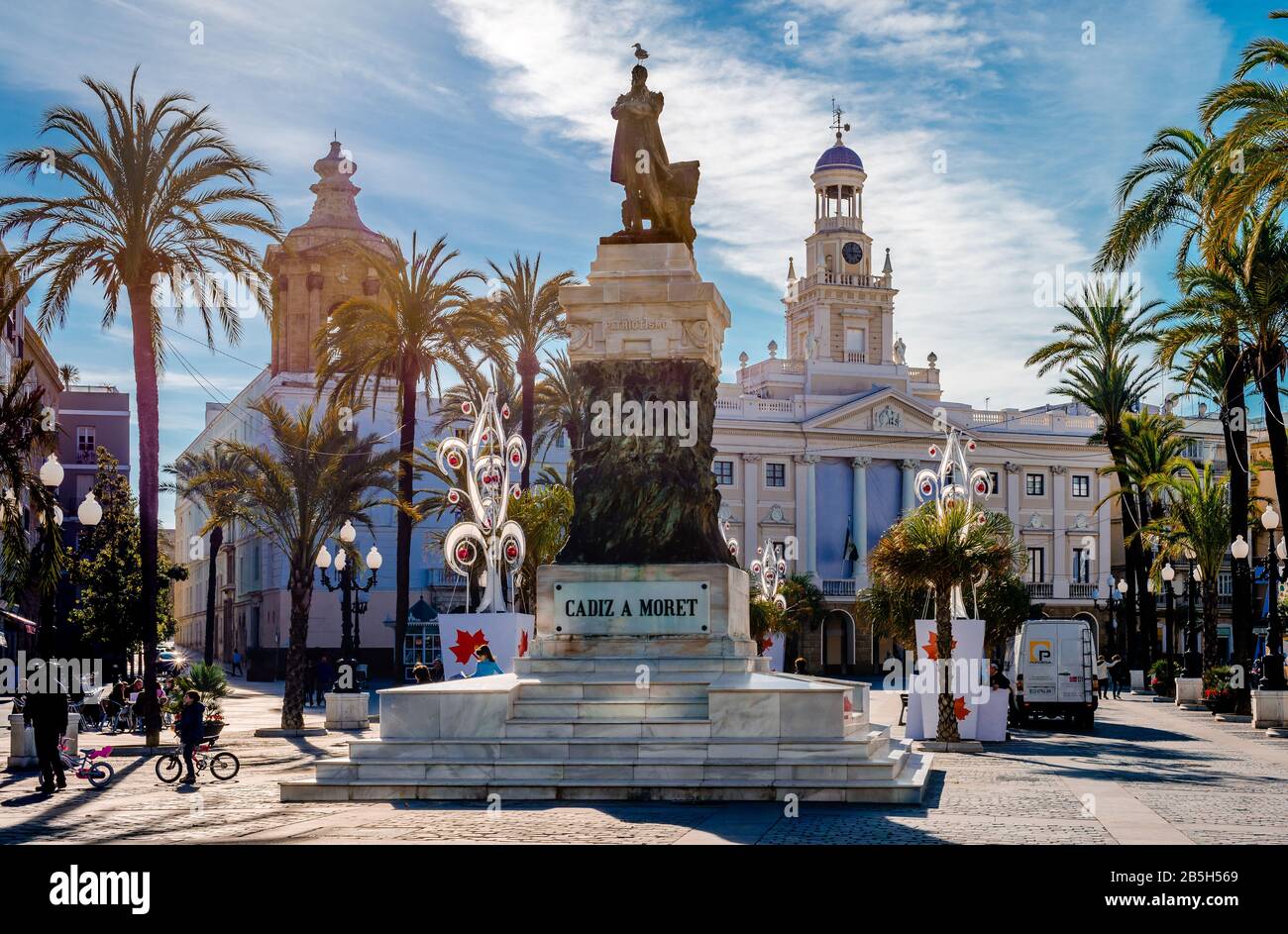 Cadiz / Spain - December 22 1014: View of Plaza de San Juan de Dios with the statue of Cadiz politician Segismundo Moret and the Old Town Hall. Stock Photo