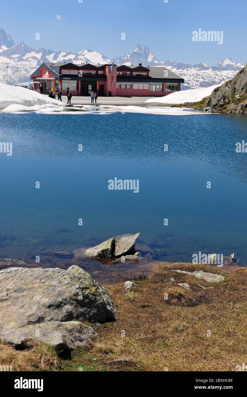 Nufenen pass, restaurant, small lake, Finsteraarhorn (left), Lauteraarhorn (right), Ulrichen, canton of Valais, Switzerland, Europe / Nufenen P Stock Photo