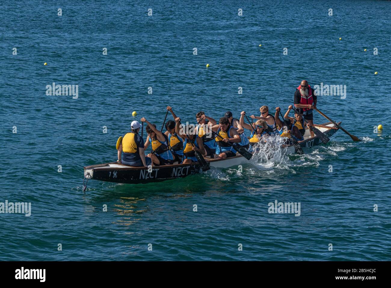 Dragon Boat Team trying to get rowers into sync Stock Photo