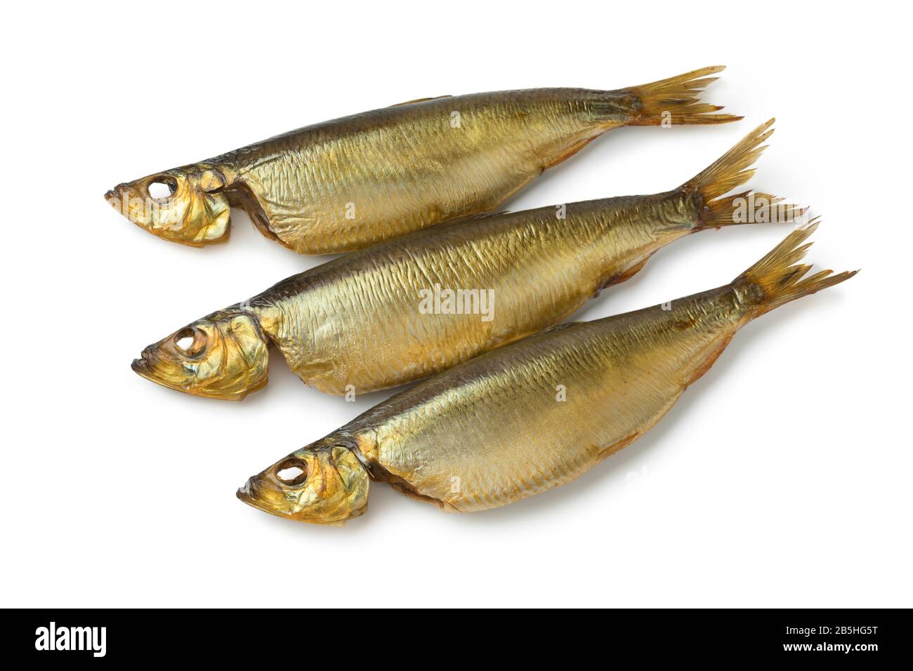 Three whole Bucklings, hot smoked herring, isolated on white background Stock Photo