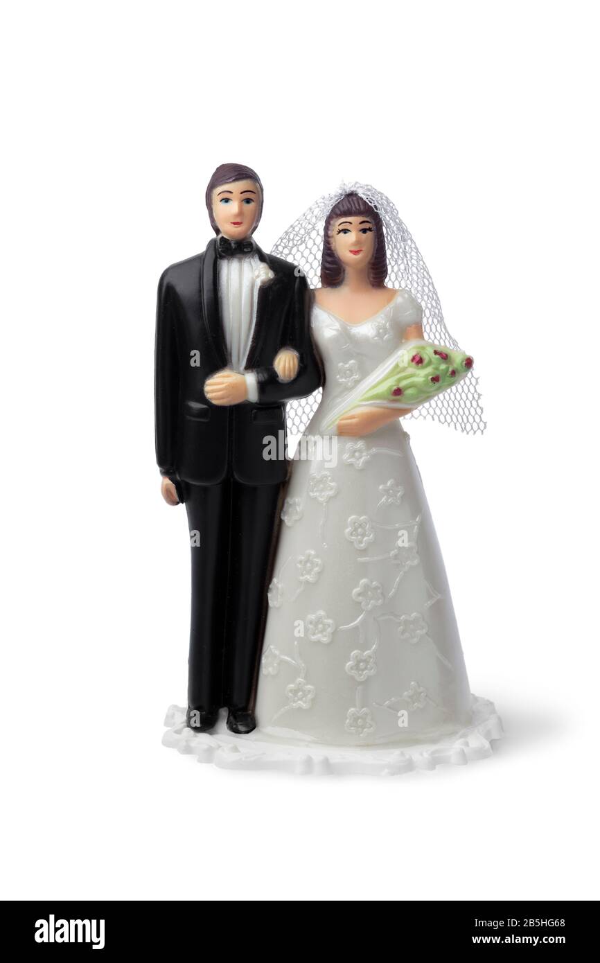 Bride and groom, vintage cake topper isolated on white background Stock Photo