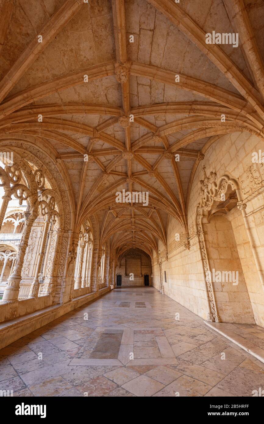 Ornamental and empty cloister at the historic Manueline style Mosteiro dos Jeronimos (Jeronimos Monastery) in Belem, Lisbon, Portugal. Stock Photo