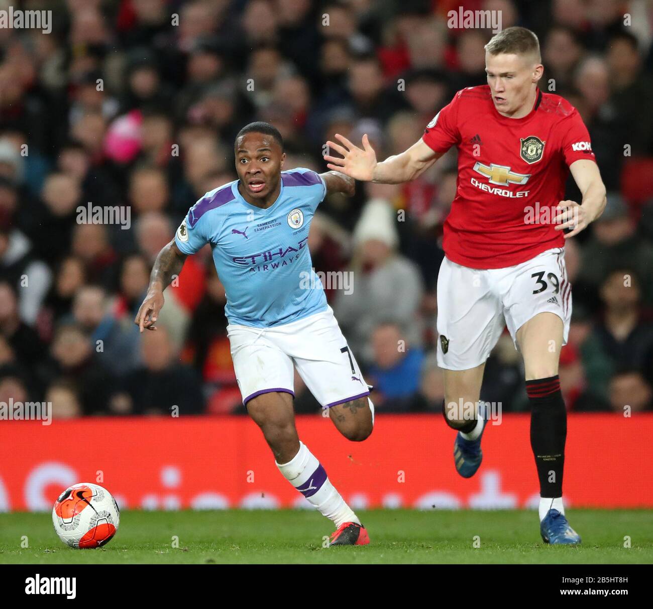 Manchester City S Raheem Sterling Left And Manchester United S Scott Mctominay During The Premier League Match At Old Trafford Manchester Stock Photo Alamy