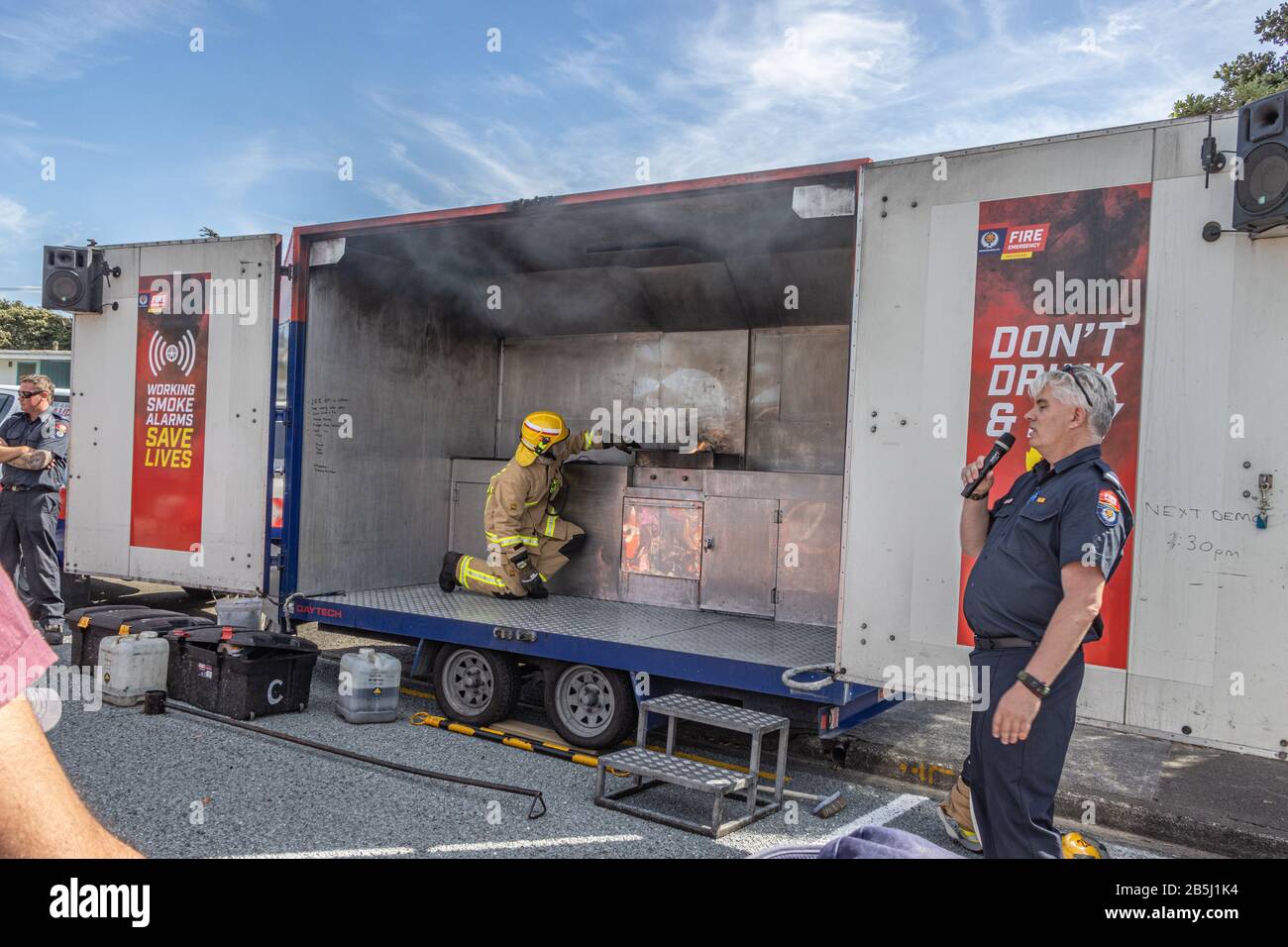 Demonstration of how to contain fire in cooking oil Stock Photo