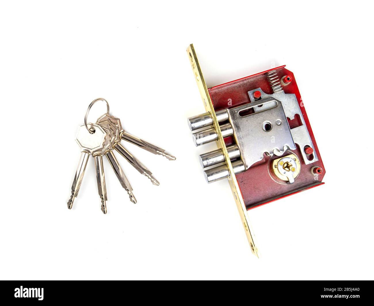 Door lock with keys on a white background Stock Photo - Alamy