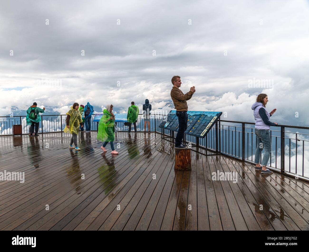 Sochi, Russia - June 1. 2018. Tourists on observation deck Rose Peak at altitude of 2320 meters Stock Photo
