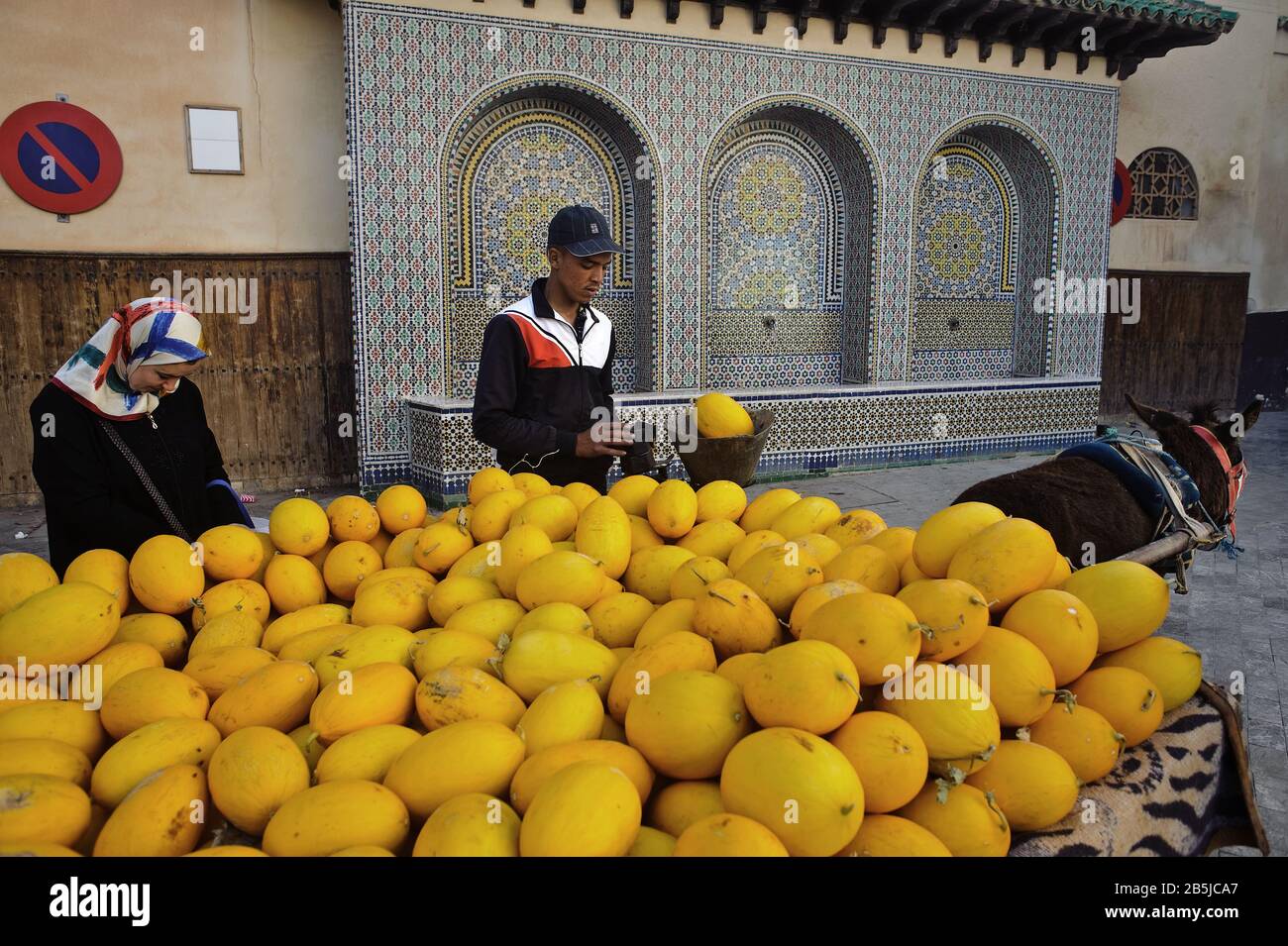 Man selling melons in the medina ( Morocco) Stock Photo