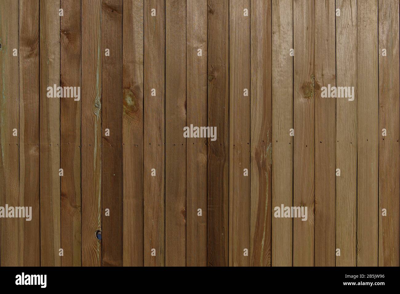 Exterior timber facade, architectural wood facade, rough timber texture, wood cladding, teak wall, old wood vertical pattern Photo - Alamy