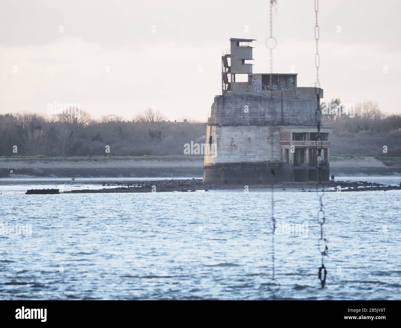 Sheerness, Kent, UK. 8th Mar, 2020. Grain Tower Battery is a mid 19th century gun fortification tower situated offshore between Sheerness and the Isle of Grain. It is only accessible at low water by a small causeway for a few hours each day. The old bomb proof fort was recently up for sale, with a guide price of £1.9 million on the Developing Spaces website. It's official address is No 1 The Thames, Sheerness. Pictured from Sheerness beach. Credit: James Bell/Alamy Live News Stock Photo