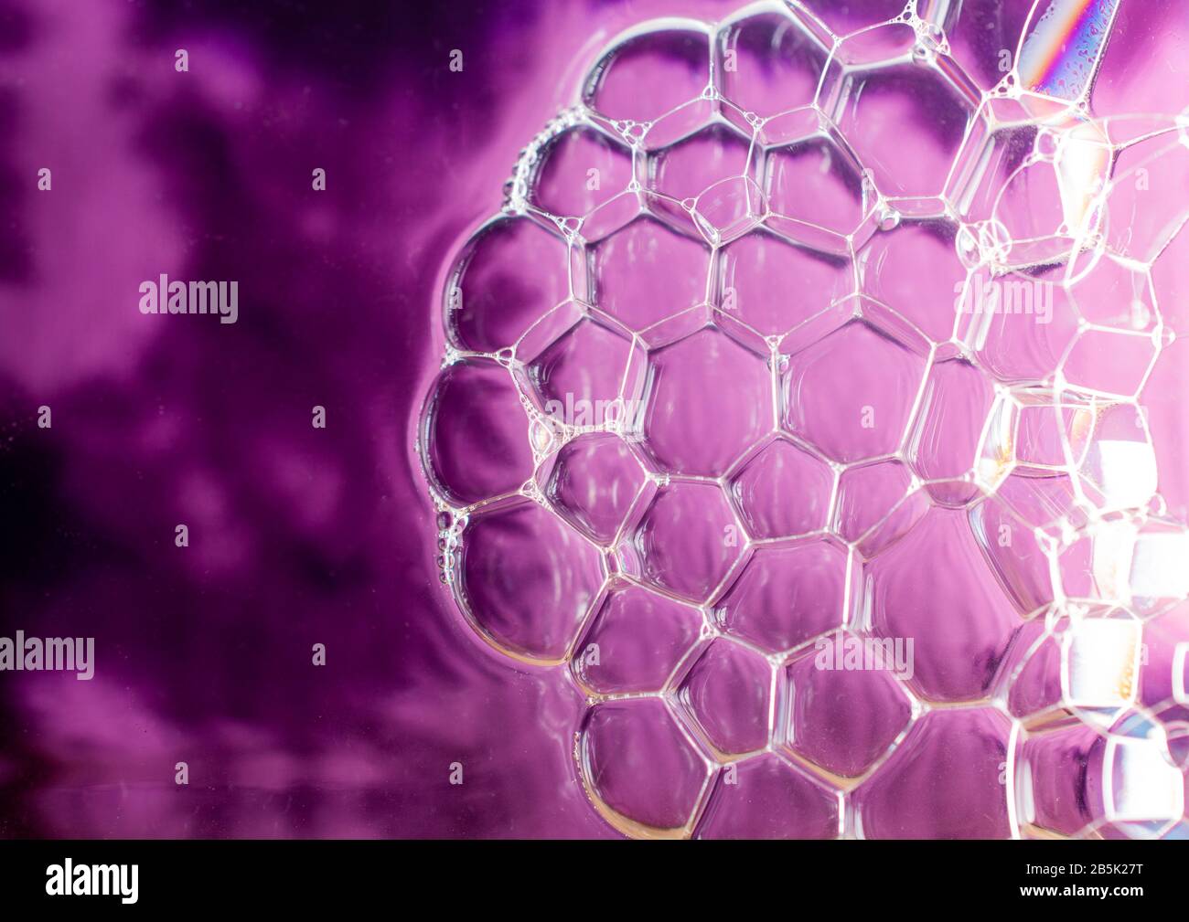 Oil bubbles inside water base form patterns Stock Photo Alamy