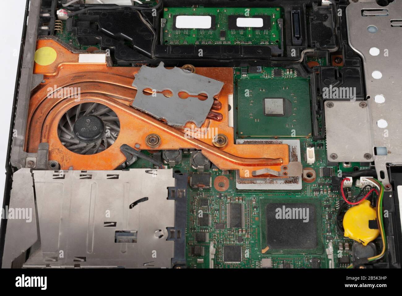 Replacement laptop CPU fan with heat sink, removed keyboard and touchpad,  close up view Stock Photo - Alamy