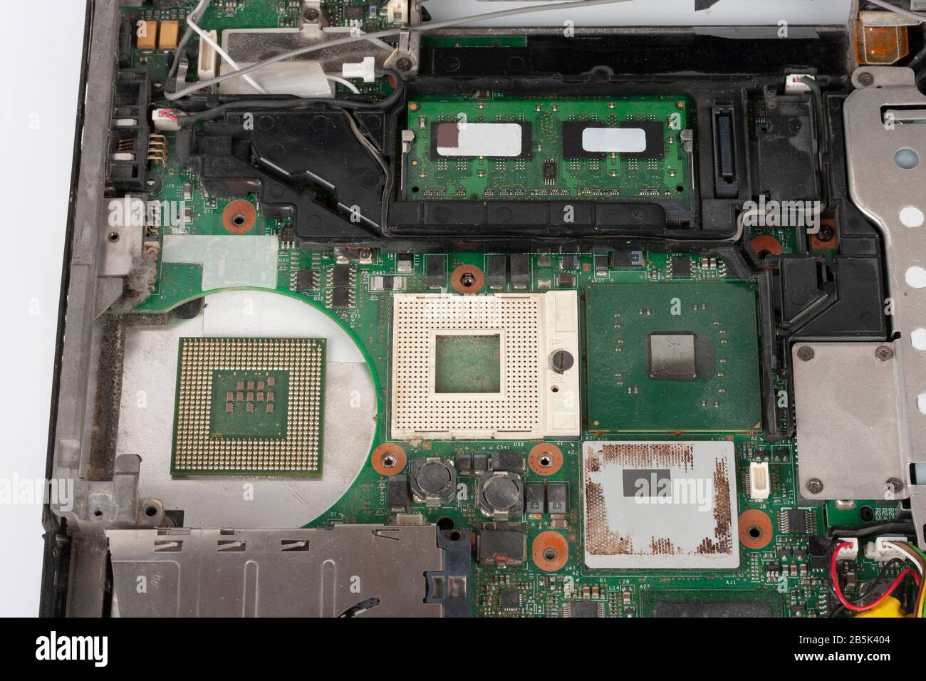 Close up of  laptop processor  with empty socket base for CPU and integrated graphics card on main board of notebook. Stock Photo