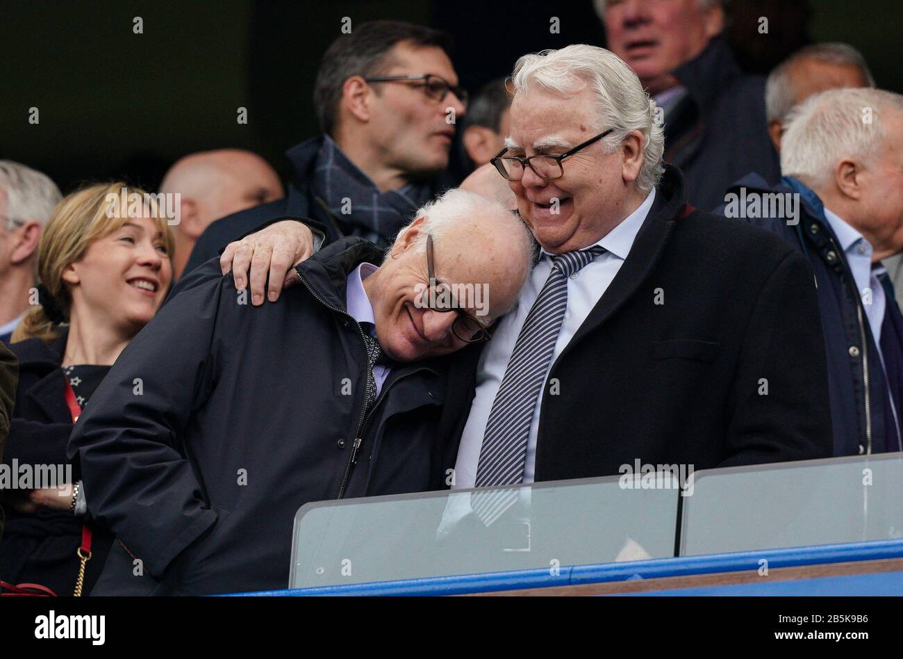 London, UK. 08th Mar, 2020. Everton Chairman William 'Bill' Kenwright, CBE embraces Chelsea Chairman Bruce Buck during the Premier League match between Chelsea and Everton at Stamford Bridge, London, England on 8 March 2020. Photo by Andy Rowland. Credit: PRiME Media Images/Alamy Live News Stock Photo