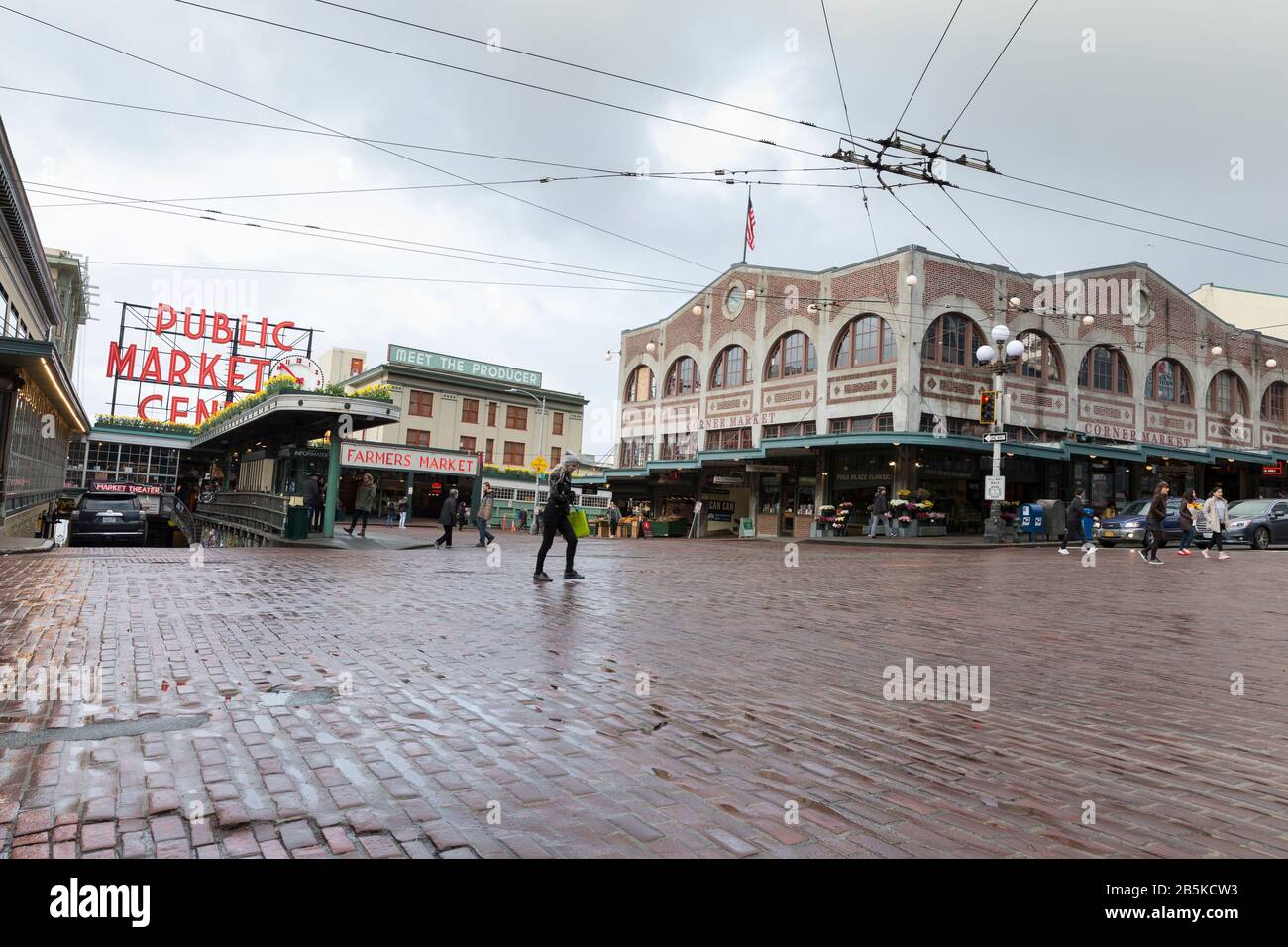 Pike Place Market is quiet on Sunday, March 8. 2020. As the epicenter of the coronavirus outbreak in the U.S., Seattle area business struggle while work and travel restrictions continue to impact the local economy. Stock Photo