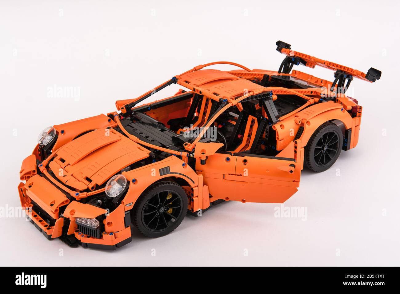 Different views of assembled orange lego Porsche GT 3RS car Stock Photo -  Alamy