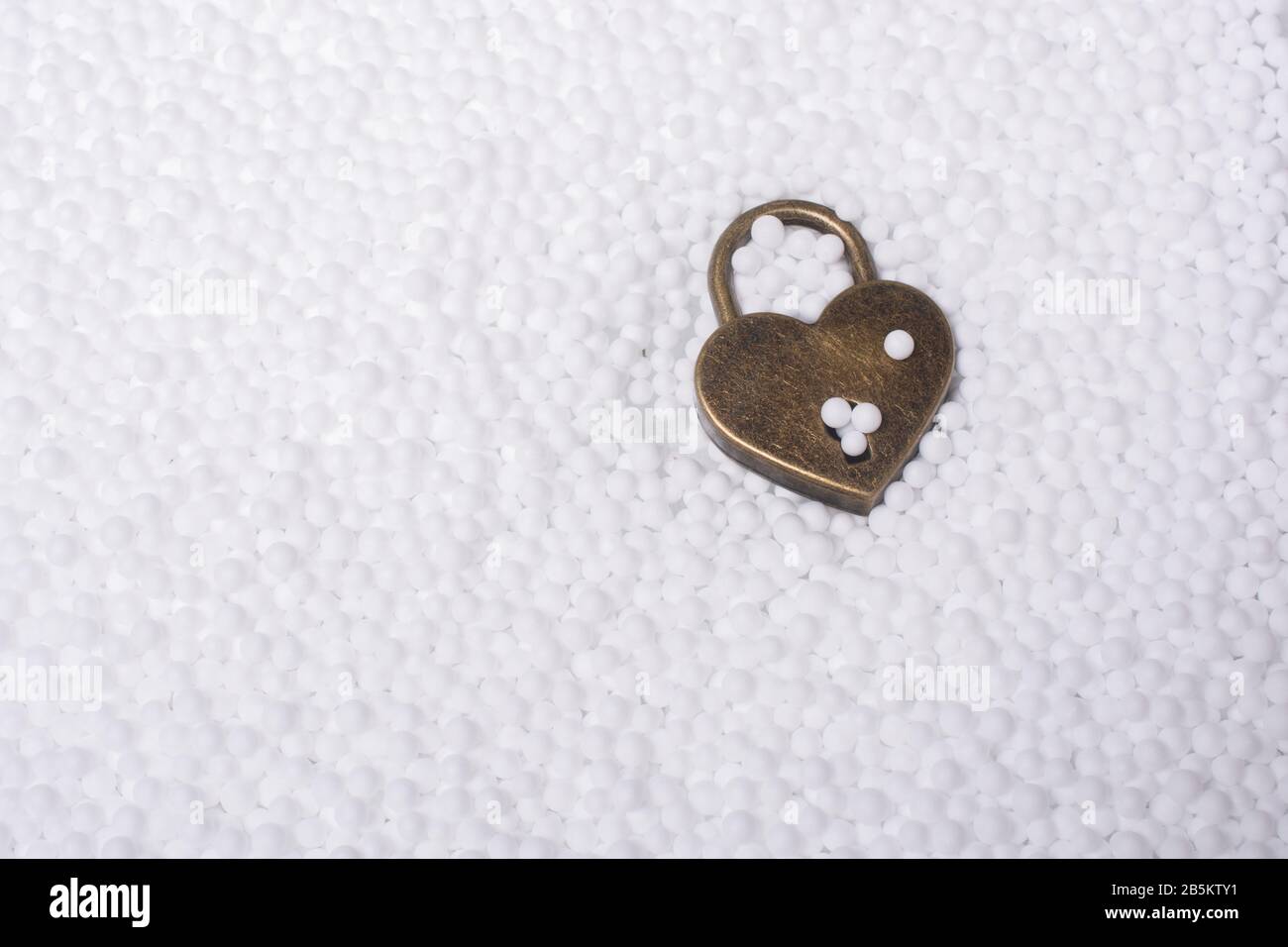 Metal padlock in heart shape as symbol of love Stock Photo - Alamy