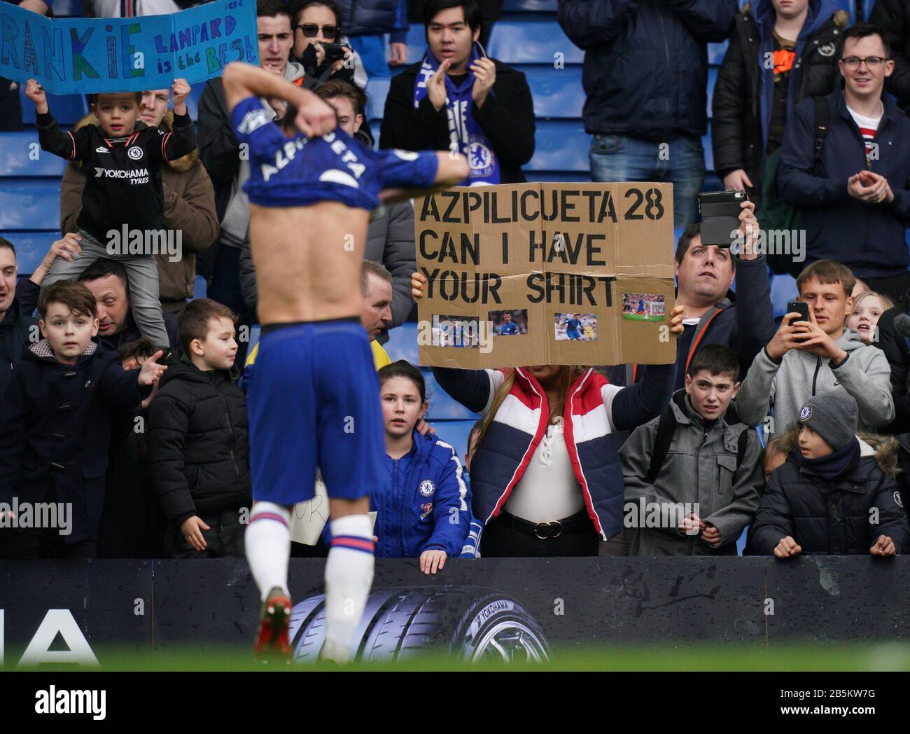 London, UK. 08th Mar, 2020. Supporters ask for Csar Azpilicueta of Chelsea shirt which he gives to them at full time during the Premier League match between Chelsea and Everton at Stamford Bridge, London, England on 8 March 2020. Photo by Andy Rowland. Credit: PRiME Media Images/Alamy Live News Stock Photo