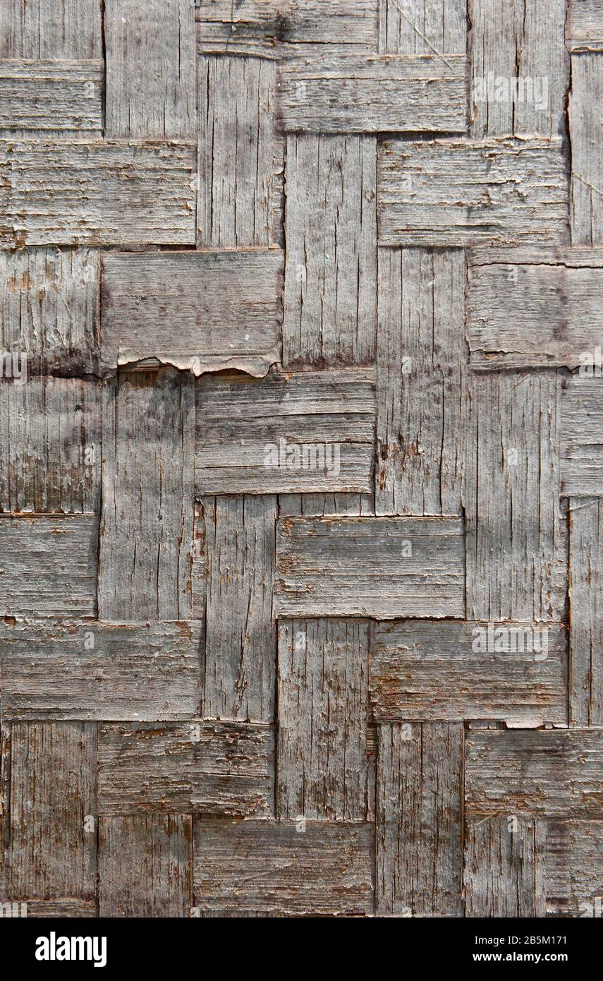 Old bamboo matboard walling at a construction site in Maizidian, Beijing, China Stock Photo