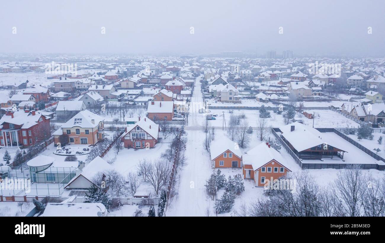 Aerial view of the snowy village in the afternoon Stock Photo - Alamy