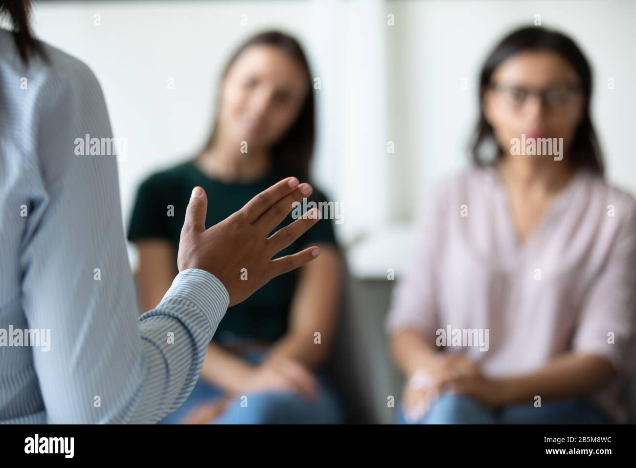 Confident female speaker standing hi-res stock photography and images ...