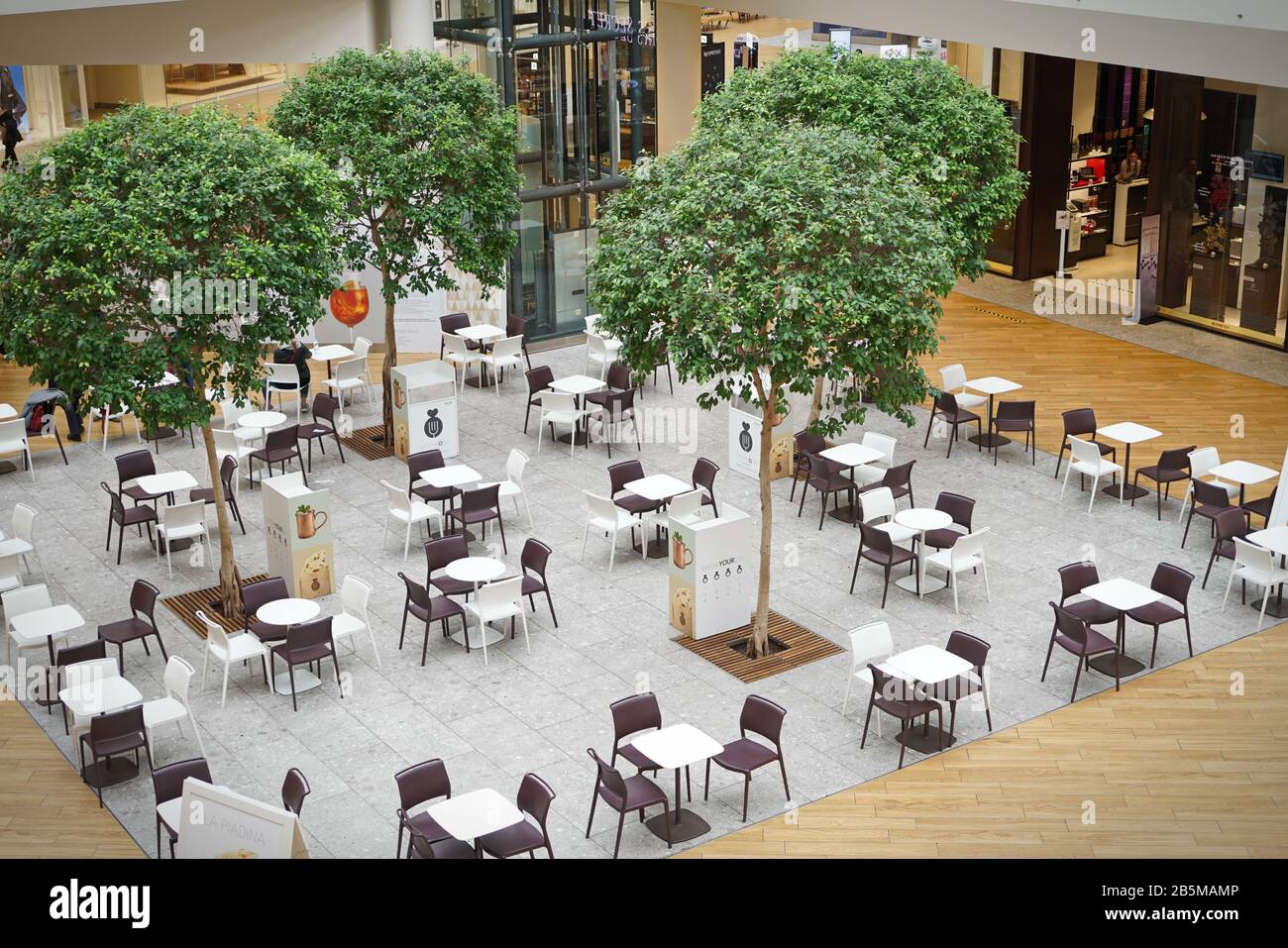 Coronavirus impact, empty restaurant and cafeteria tables.  Milan, Italy - March 2020 Stock Photo