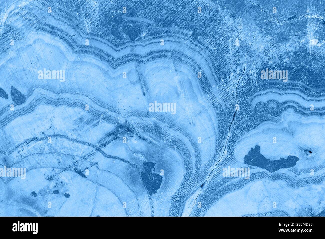Cross section of abstract blue fantasy mineral, color of the year 2020 pantone classic blue 19-4052 Stock Photo