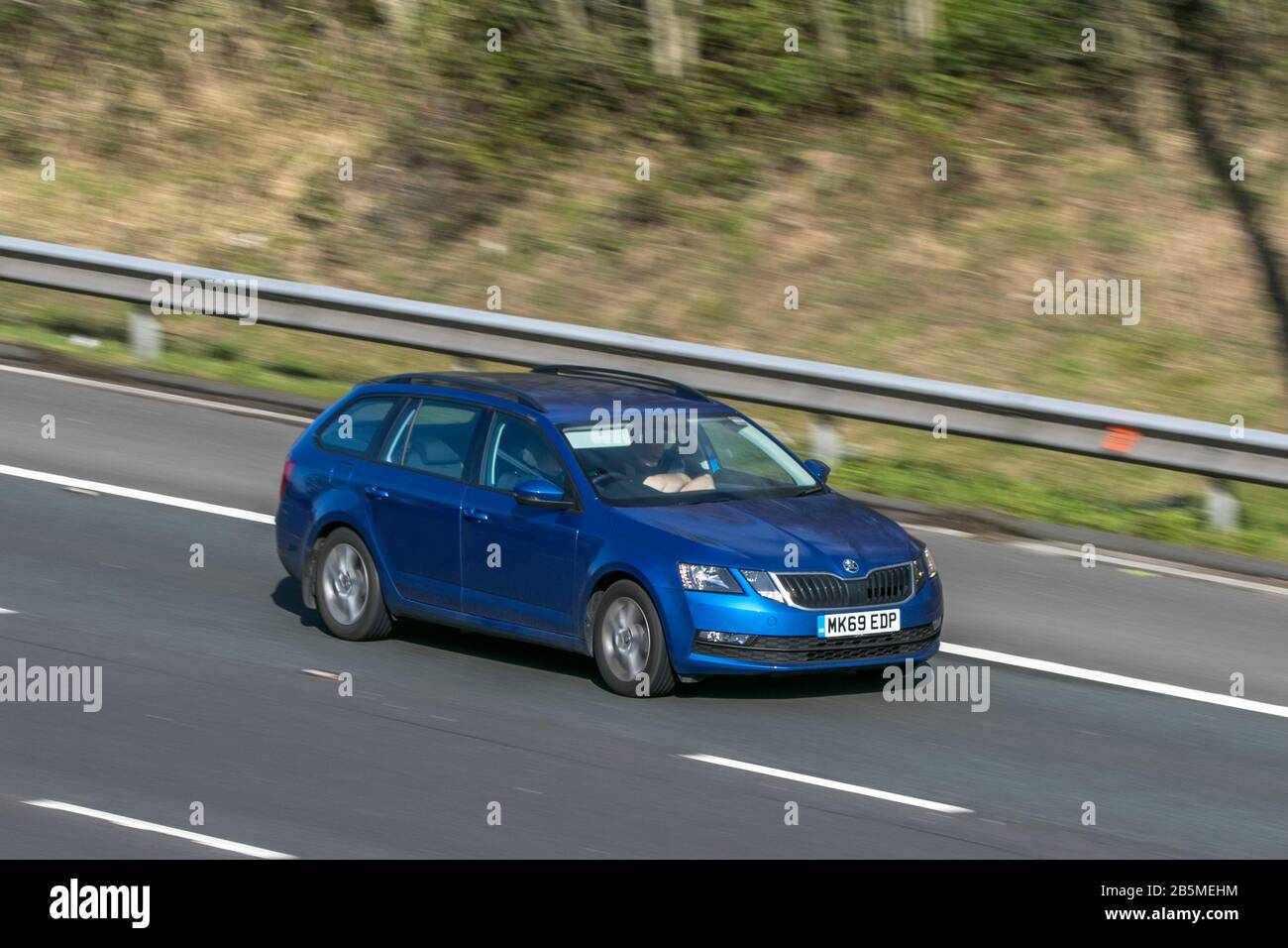 MK69EDP Skoda Octavia Se Tdi S-A Blue Car Diesel driving on the M6 motorway near Preston in Lancashire, Uk Stock Photo