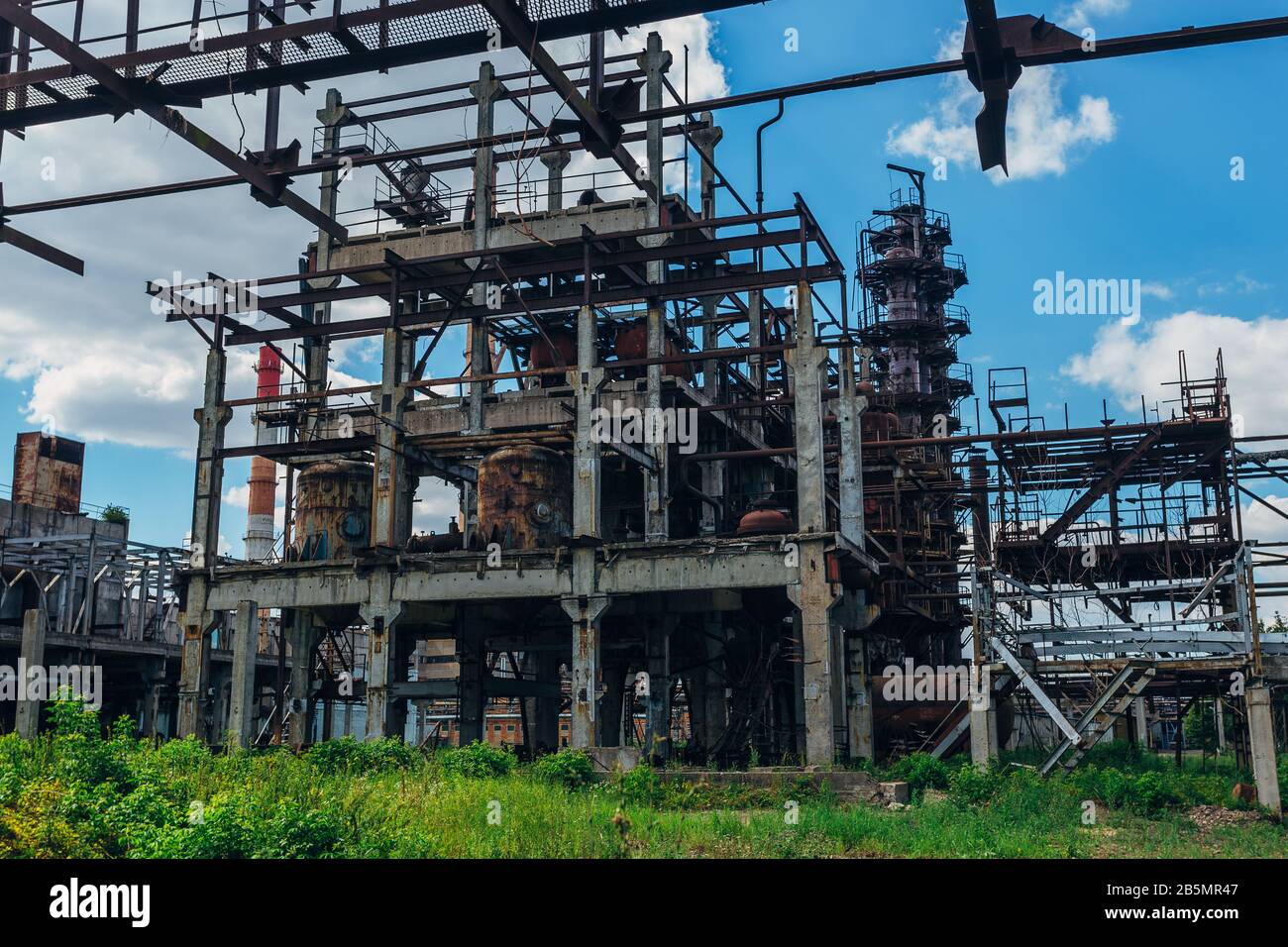 Abandoned forgotten ruined chemical plant overgrown by plants and trees  Stock Photo - Alamy