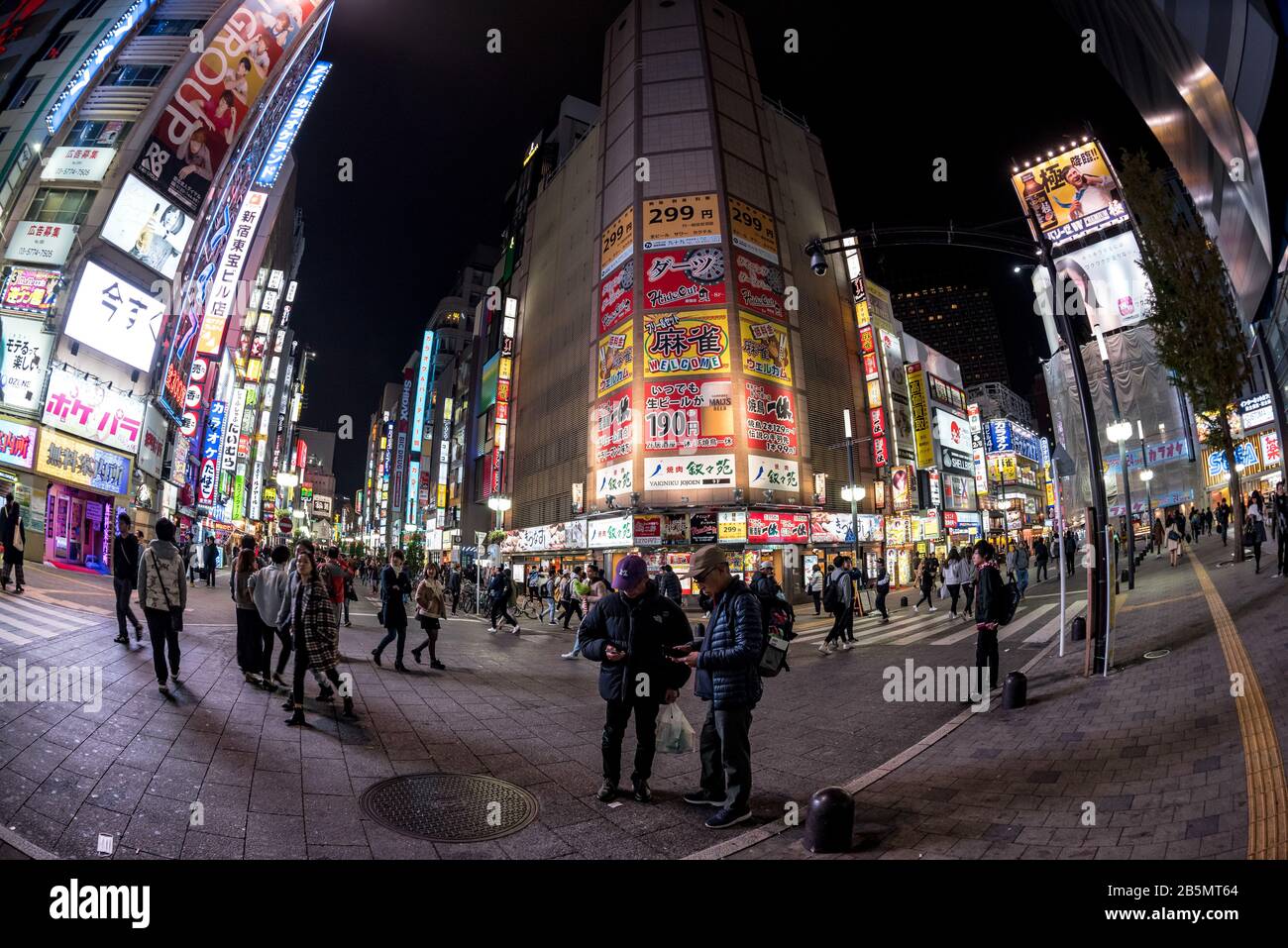 Crowded streets, Kubukicho entertainment district, Shinjuku, Tokyo, Japan Stock Photo